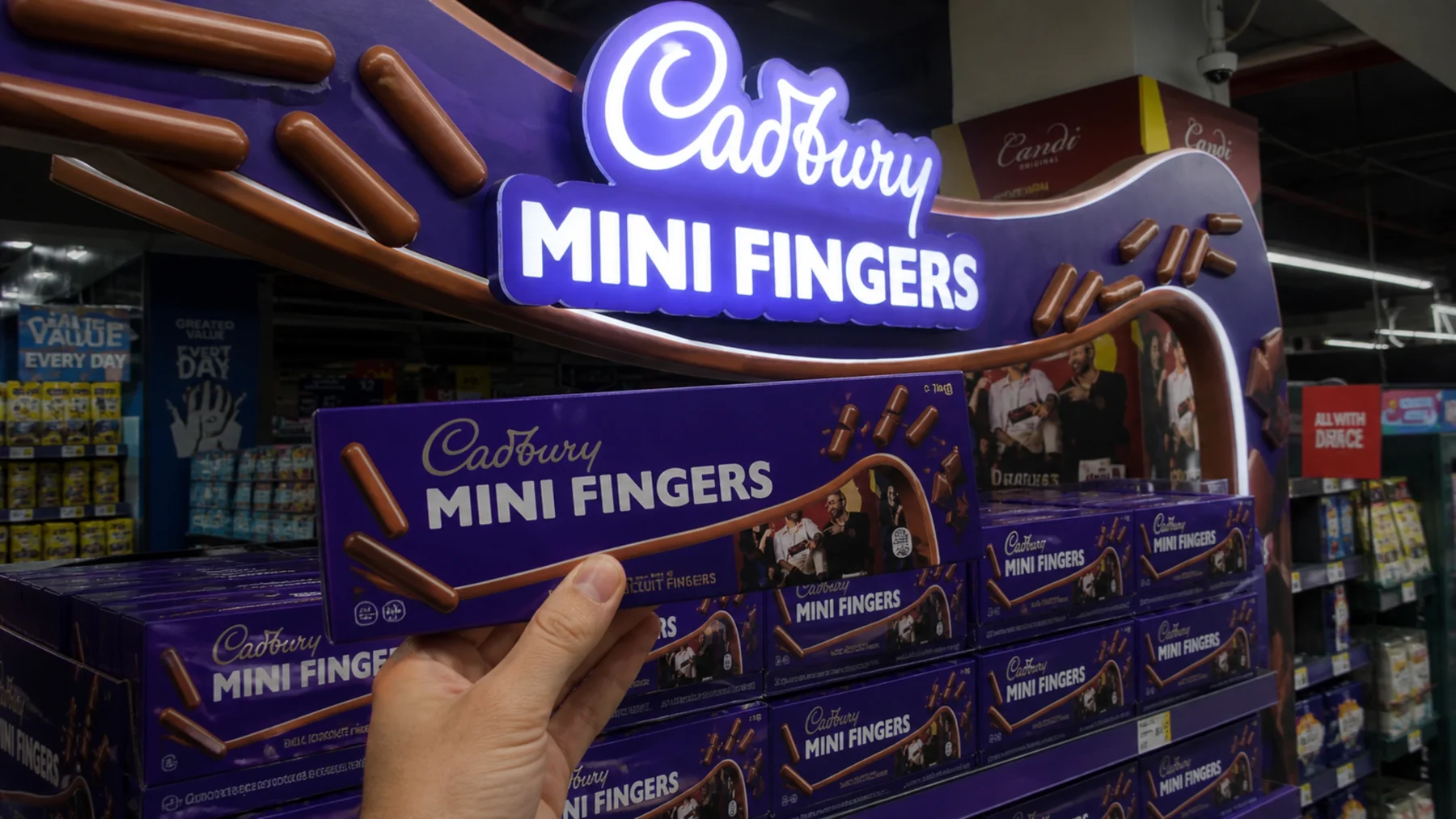 Cadbury Mini Fingers pack held against the gantry