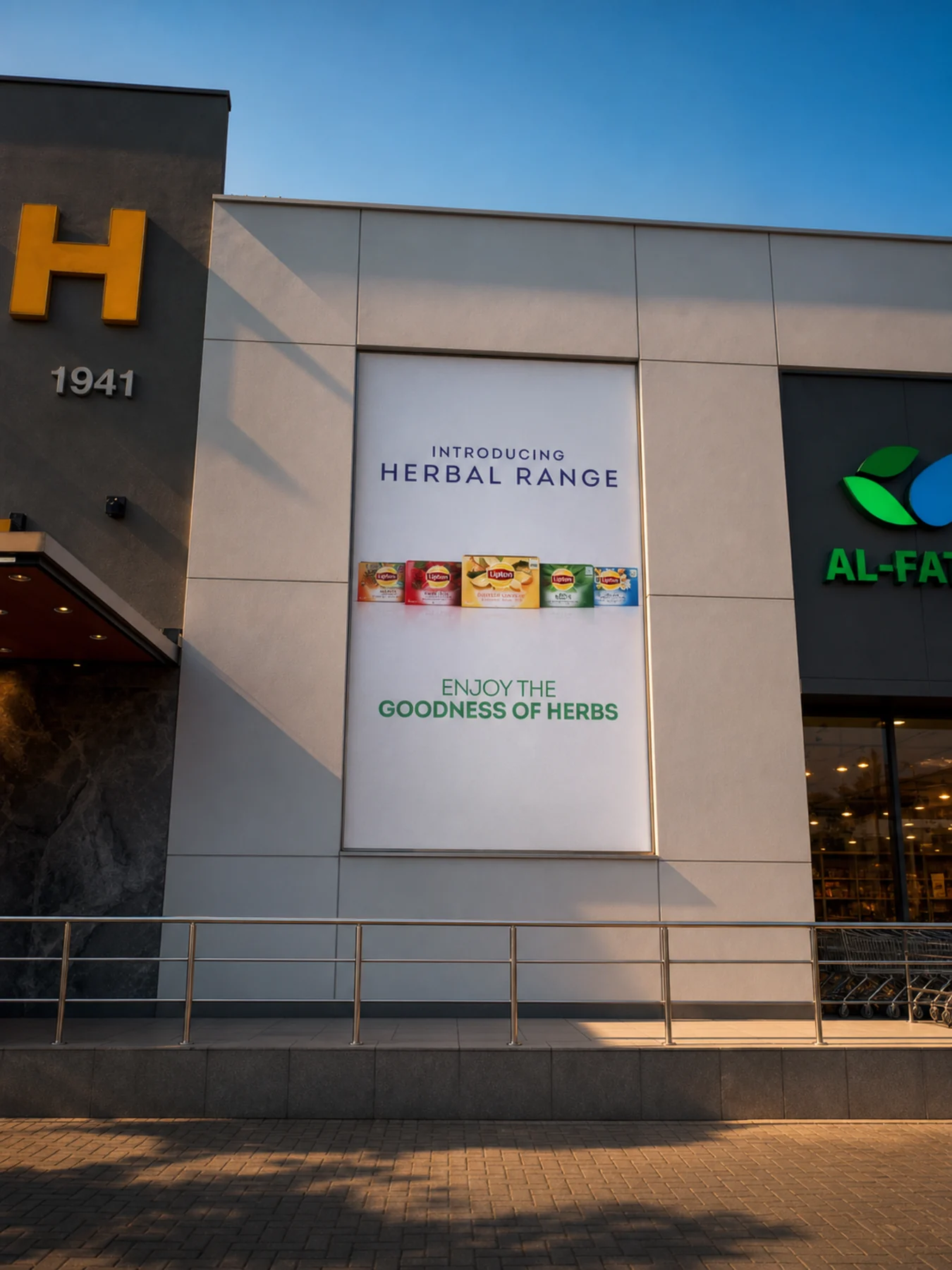 Lipton herbal range graphics across the Al-Fatah store façade