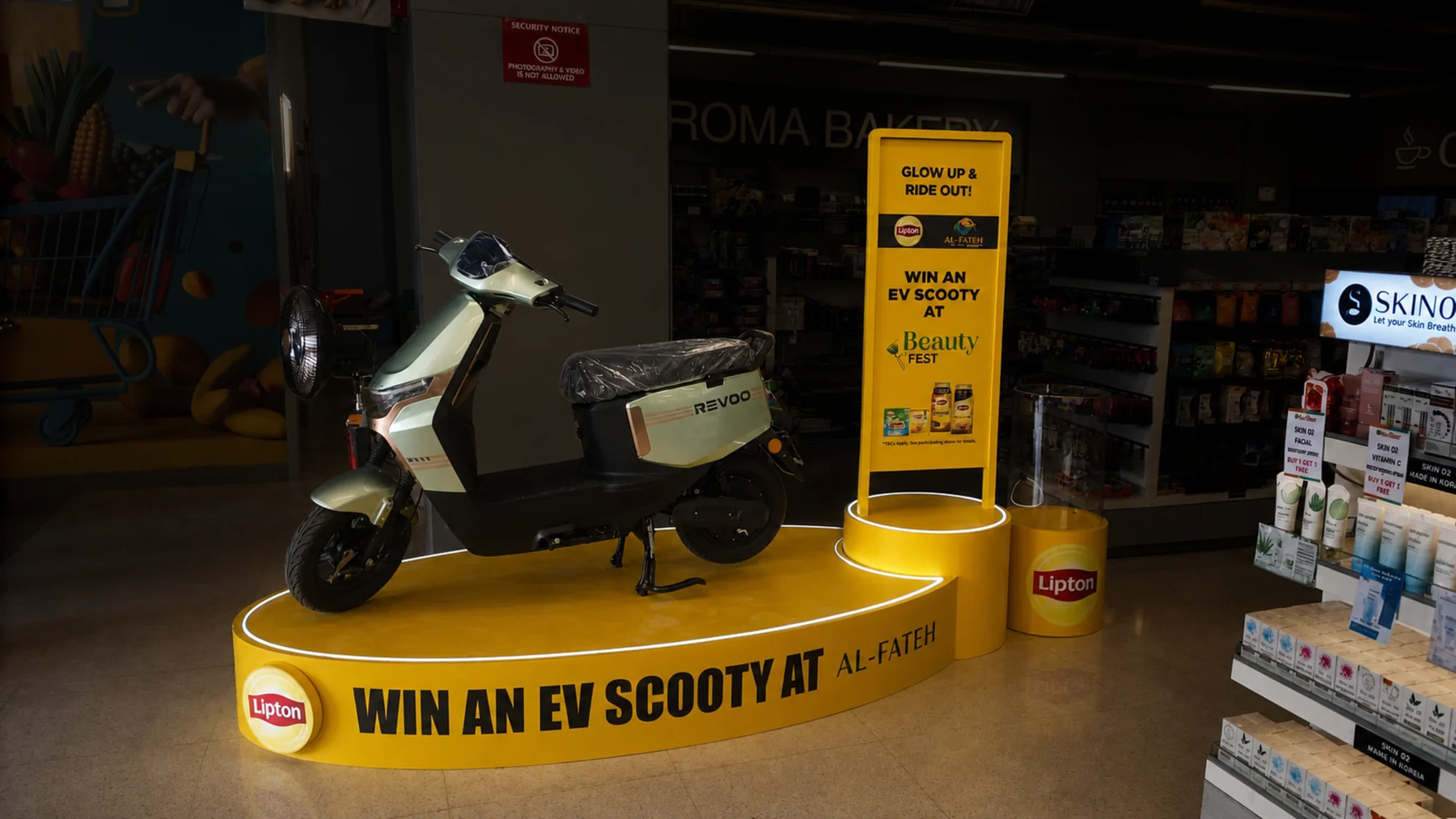 The EV scooty podium installed in a store aisle