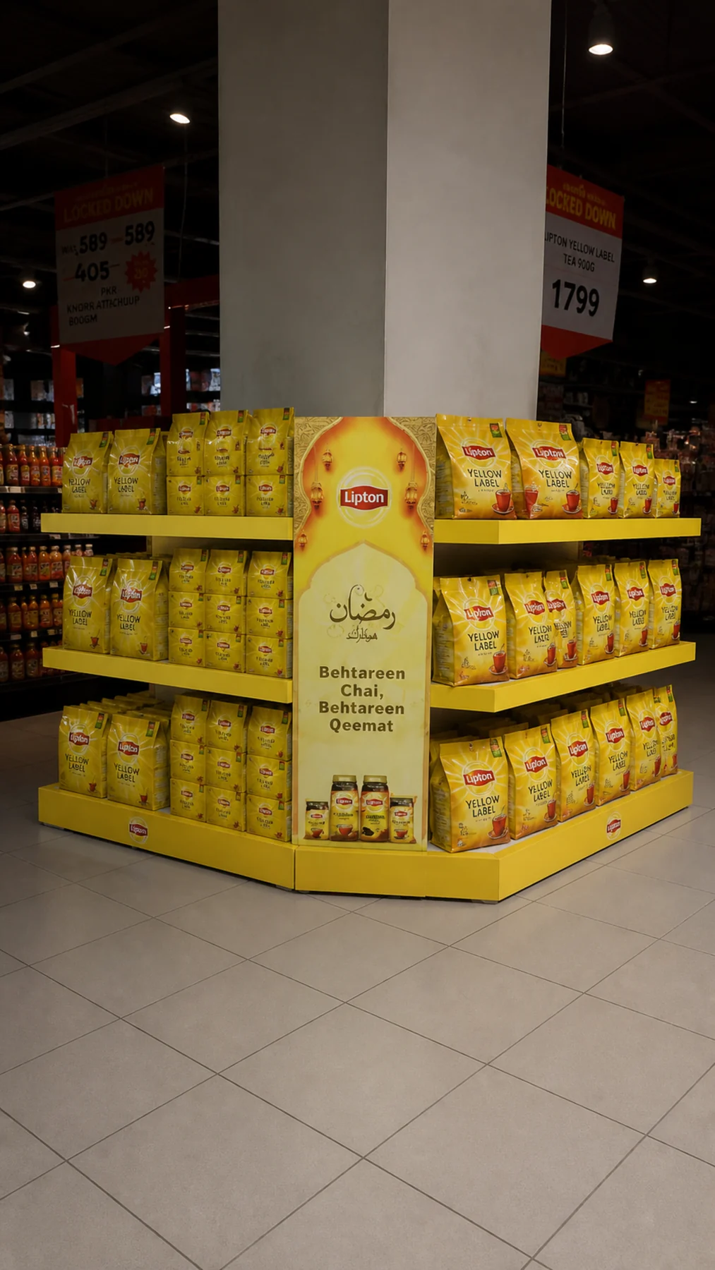 The Lipton Ramzan pillar-wrap podium before stocking, showing its three shelf tiers