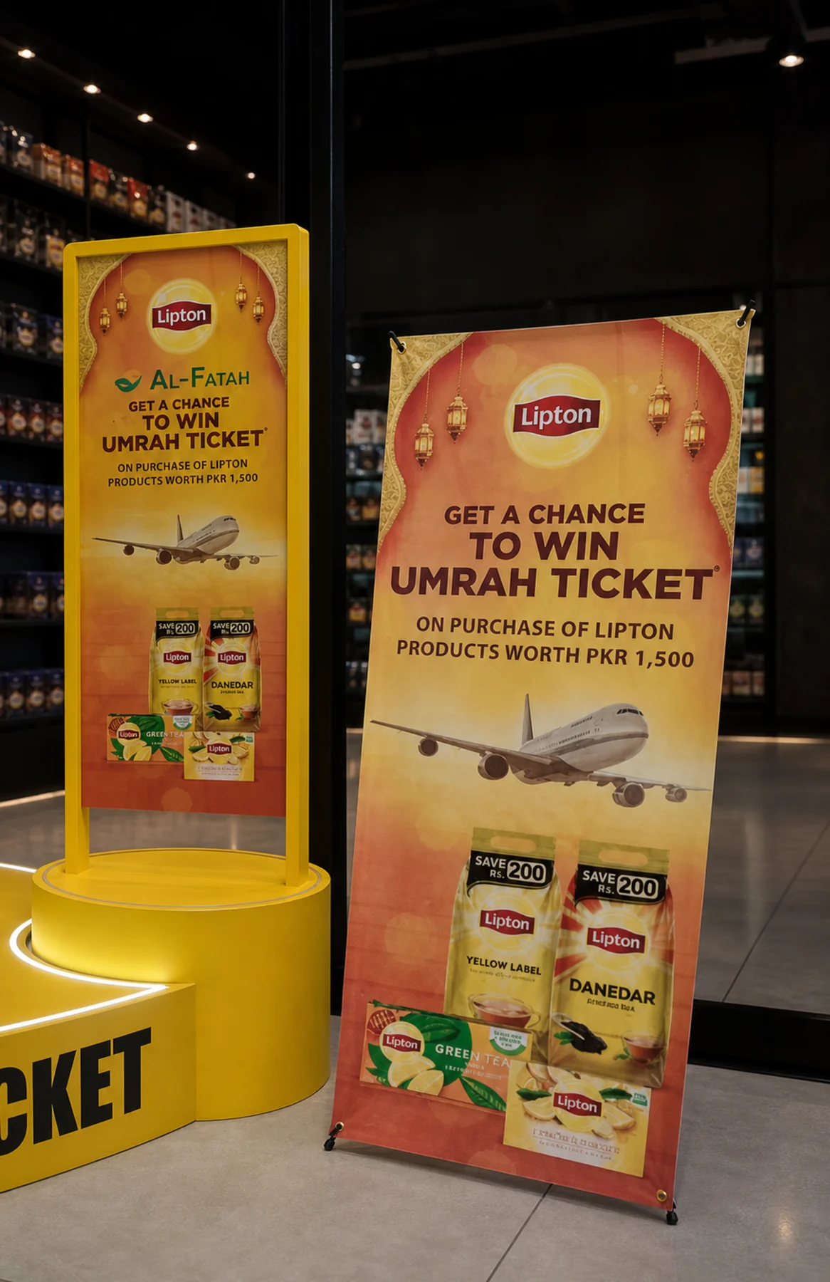 Lipton campaign standees connecting the promotion to the Al-Fatah retail zone