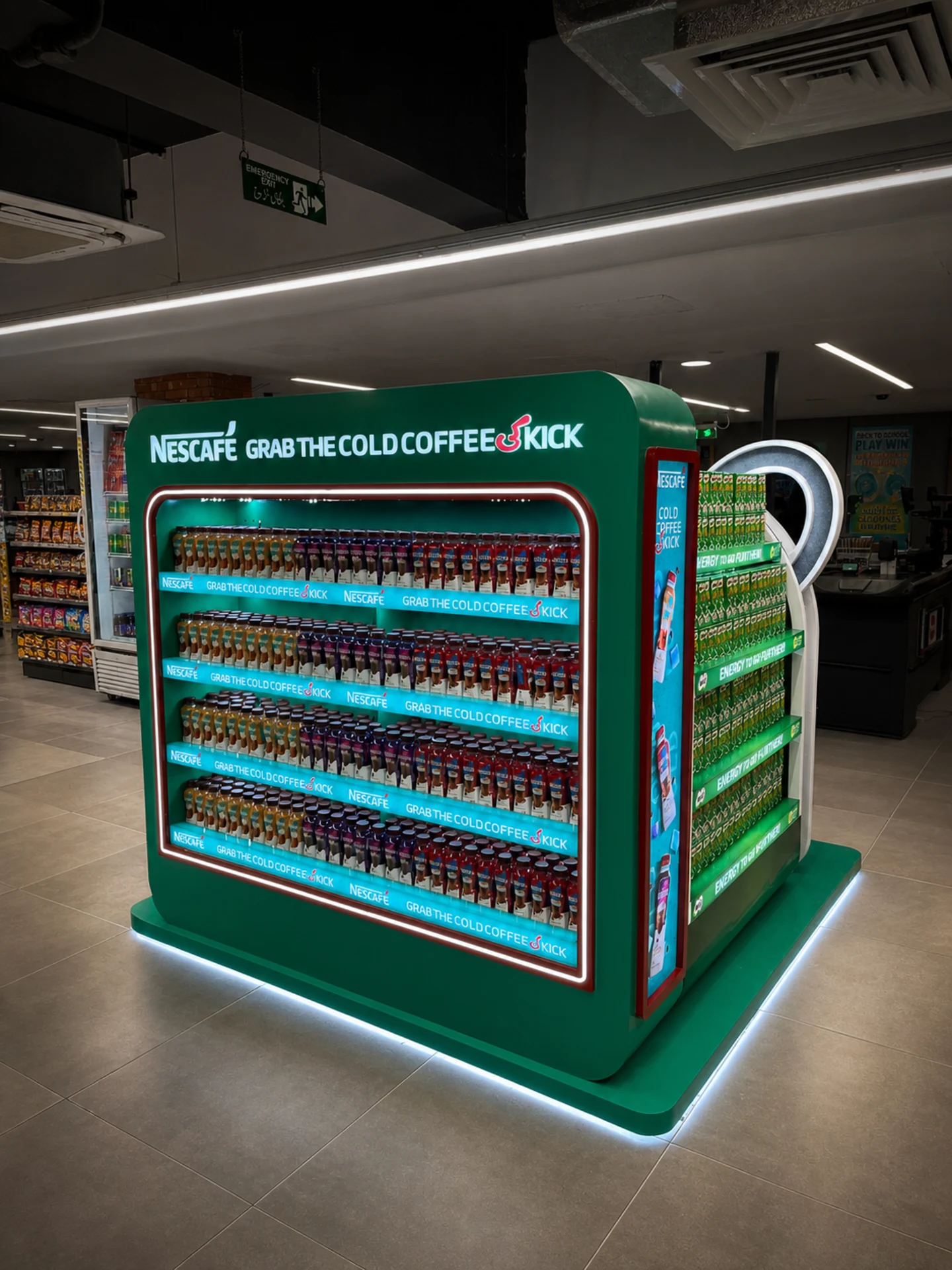 Illuminated Nescafé cold coffee face with Milo shelving on the adjacent side
