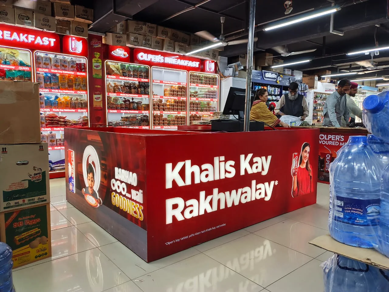 The wrapped checkout counter seen from the store floor
