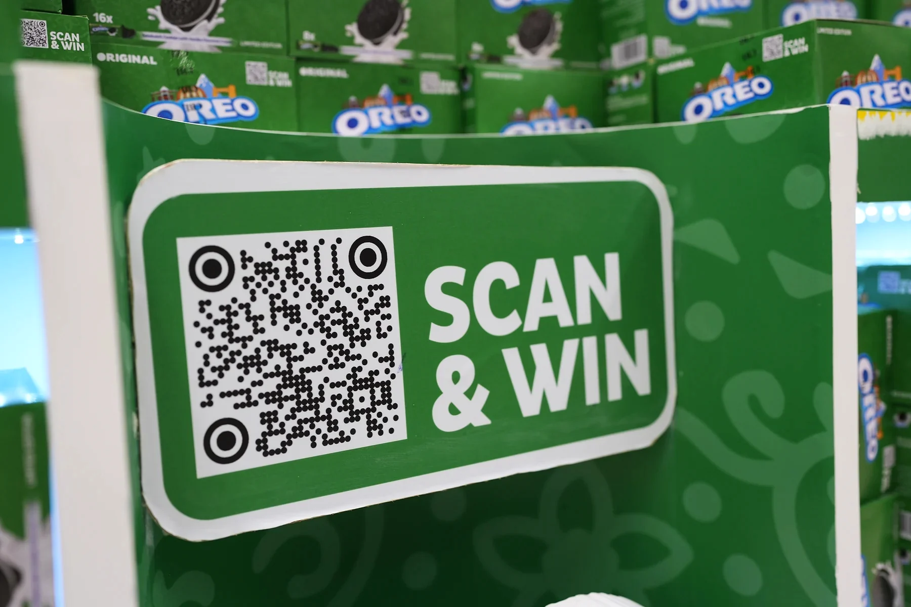 Scan and win QR panel mounted on the Oreo freestanding unit