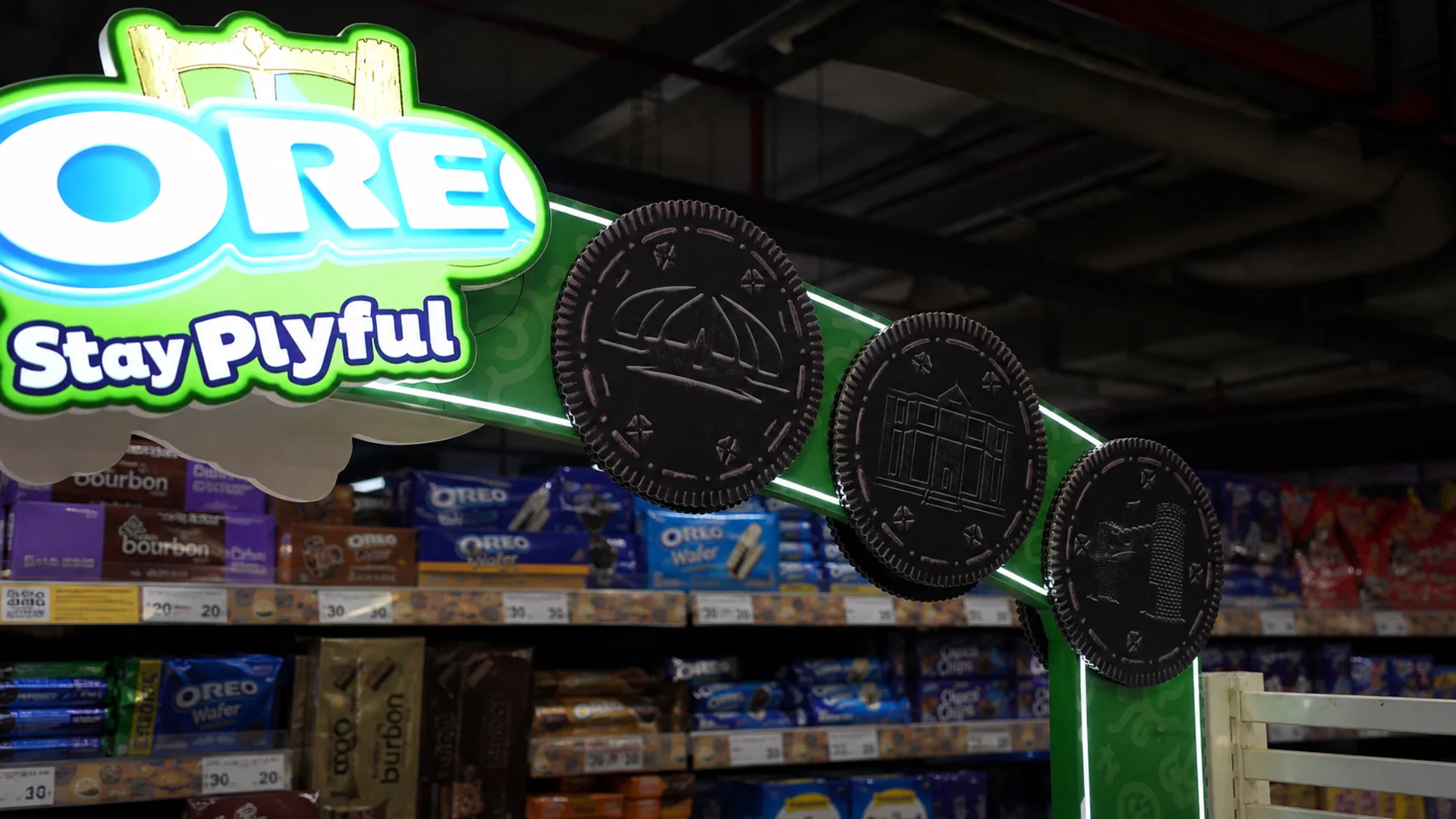 Oreo arch discs and illuminated sign seen from below