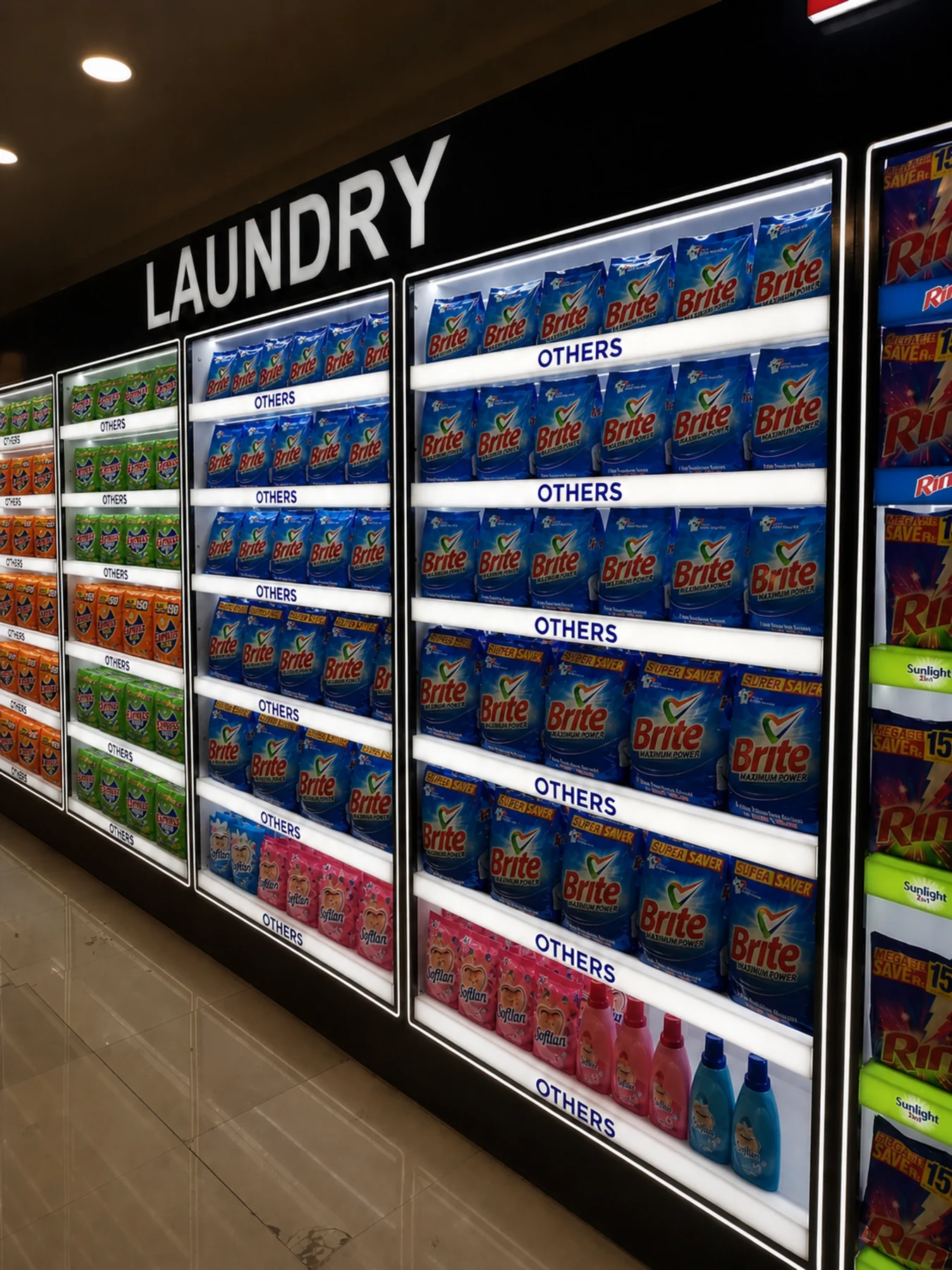 Illuminated laundry bay with stocked product shelves