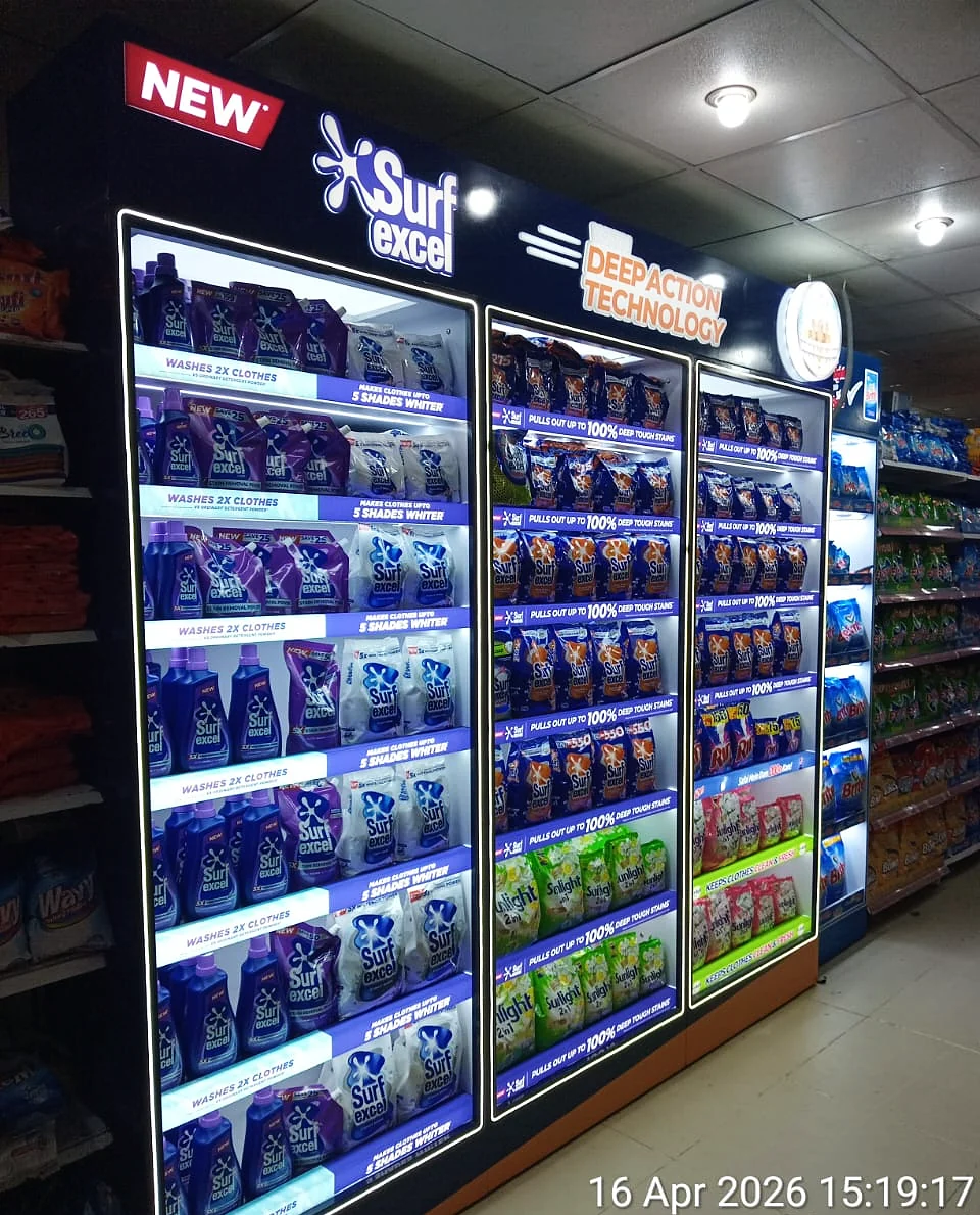 Tall illuminated Surf Excel end unit carrying the new range